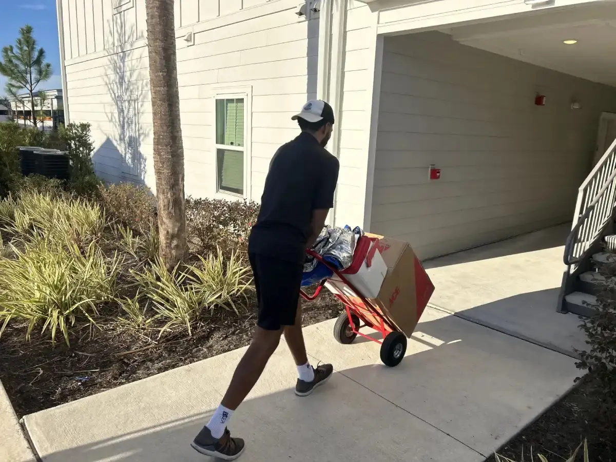 Happy 2 Help Moving crew loading at a Northeast Florida home